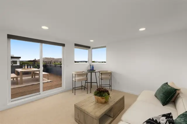 3Rd floor loft with expansive entertainment sized view deck. Enjoy sweeping views of the Puget Sound, Olympic Mountains, and sunsets.