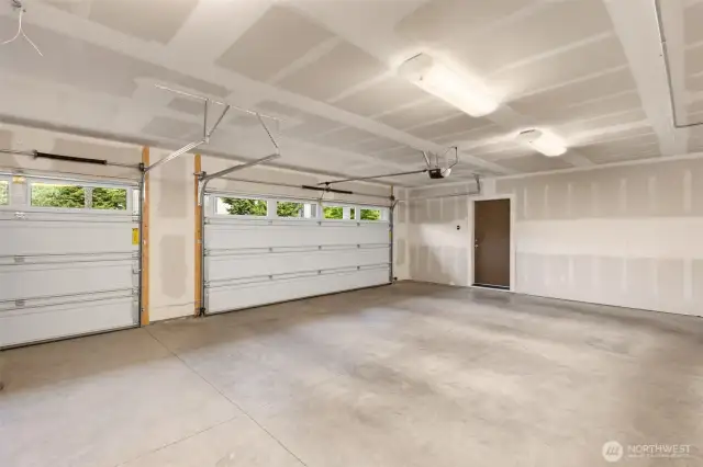Oversized 3-car garage with EV Charger.