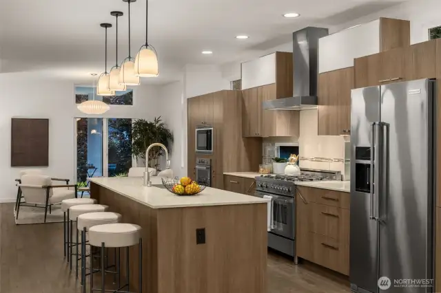 Modern sleek design, open-concept layout, hardwoods floors, and a Chef’s kitchen appointed with premium SS Bertazzoni appliances, designer cabinetry, and a centralized island ideal for entertaining and daily living.