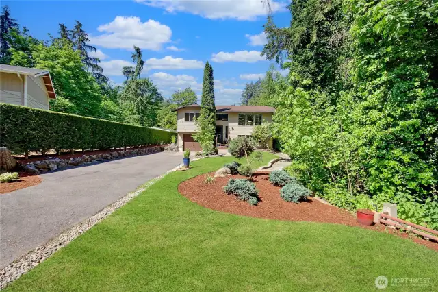 Set down a long driveway - beautifully landscaped