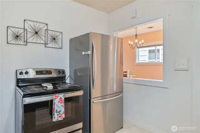 Kitchen opens to dining area