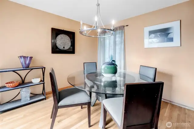 Dedicated dining room conveniently located between kitchen and entry to the outdoor decks for easy entertaining year round.