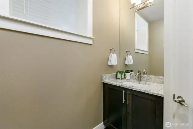 Powder room at entry level.