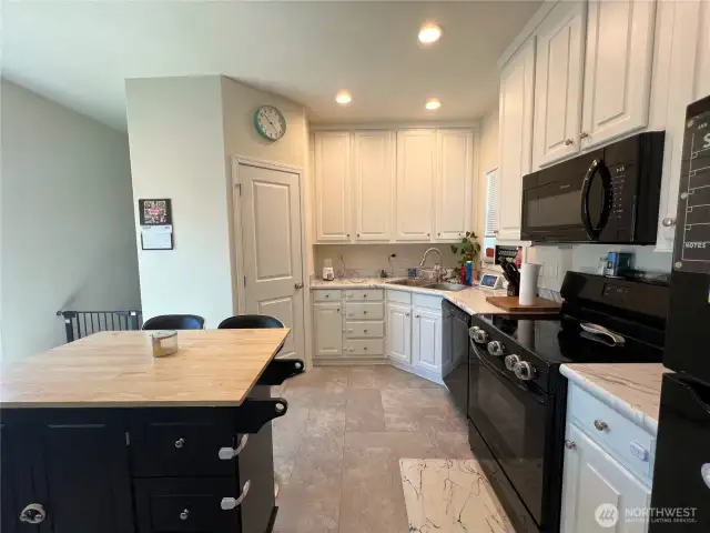Lovely kitchen with ample cabinet space.