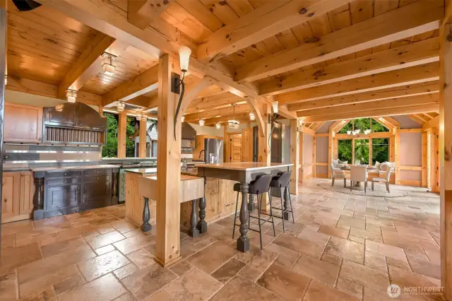 Open concept floor plan with eat up granite breakfast bar, & limestone counters