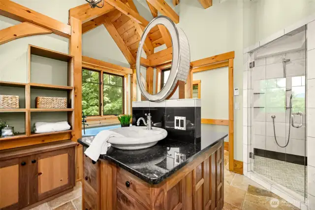 Double vanity. Bathroom has view of Lake Whatcom