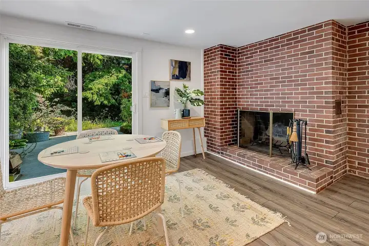 Wood fireplace in second living room.
