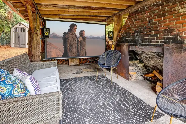 Have a fire or watch a movie in this outbuilding.