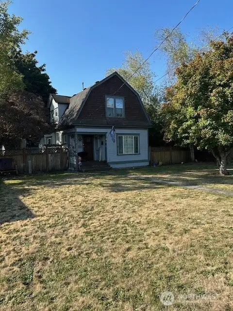 Cozy house! Old time charm! A large front yard too!