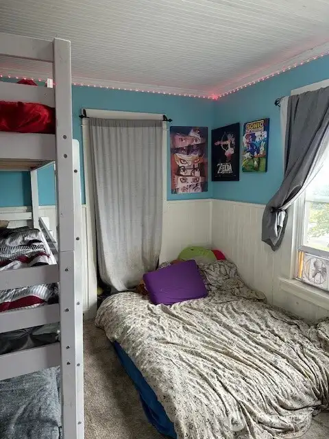 one of three bedrooms upstairs! Two closets are located in this bedroom