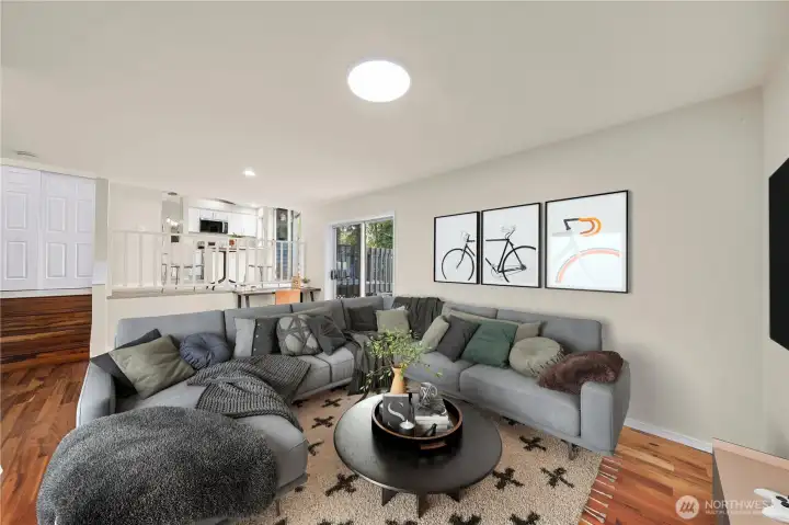 Large Family room w/sliding door out to the patio. Virtually satged