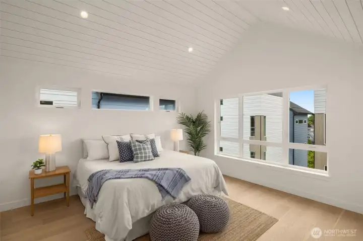 Up the stairs you will find your luxe primary suite. Enjoy the spacious feel from the gabled roofline & hardwood throughout the entire home.