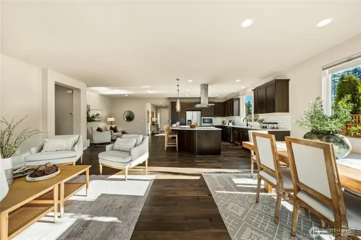 Tons of natural light streams into this home as it enjoys a plethora of Southern and Western exposure. Extensive Engineered hardwoods & ample living spaces. Custom window coverings throughout.