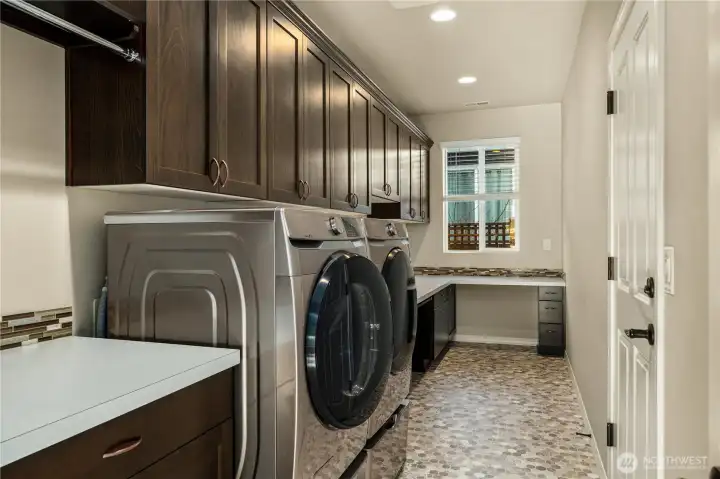 The Smart Space/laundry/mud room/craft/work and or hobby space!  Offers great organizational space as well.