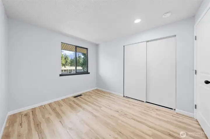 Looking at the home from the outside the window on the right above the garage.