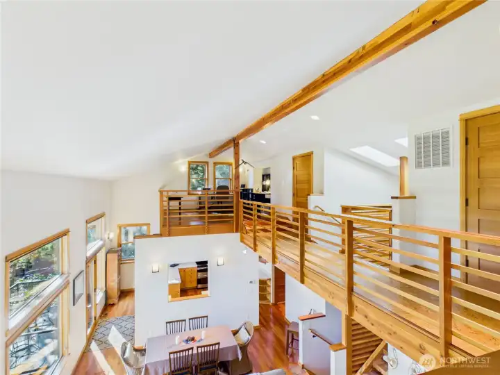 Mezzanine level houses flex space that is currently an office and family/tv space.