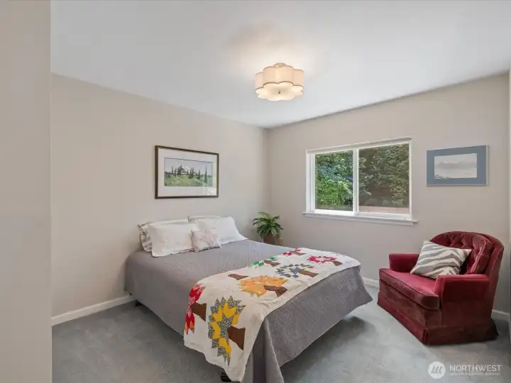 Bedroom #3 overlooking the Backyard & Forest.