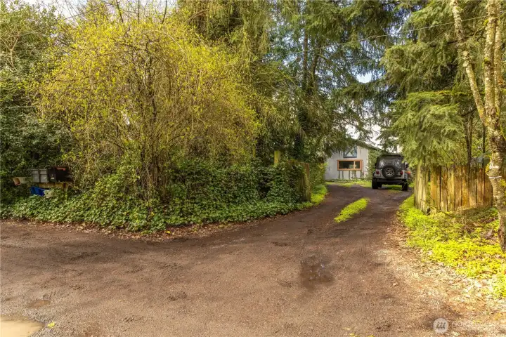 Driveway #2 located on the North side of the property, also looking Westerly from 118th Ave SE.