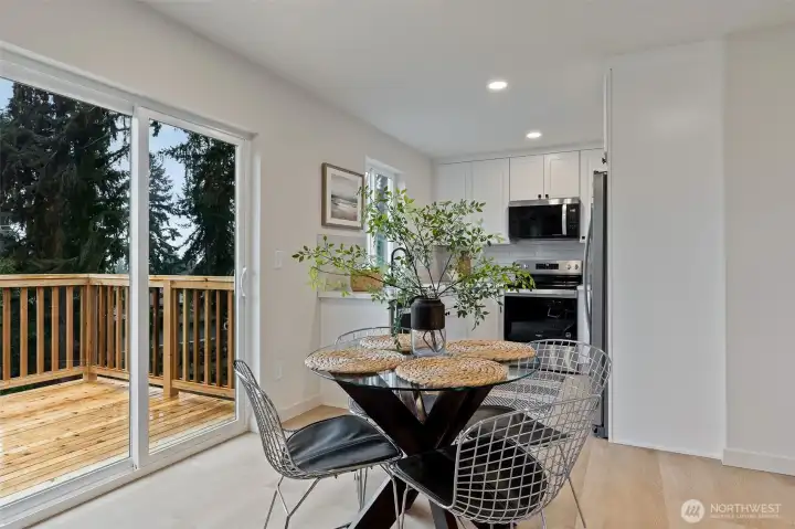 Photos for reference only. Similar features/floorplan. Eating Space with Deck Access