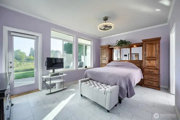 Primary has a door leading out to the patio and overlooks the expansive greenbelt. Lay in bed with a coffee and just enjoy that view. Or wander out to the patio and listen to the birds over a morning cup of Joe!