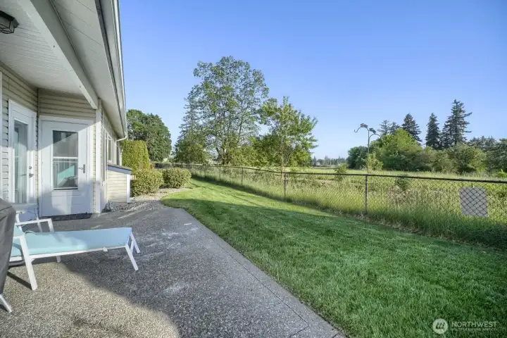 Back patio with enough room to BBQ or just lounge and relax.