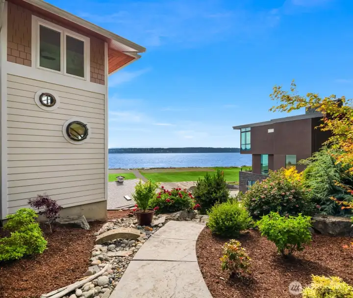 Beautifully landscaped grounds lead to 150 feet of pristine waterfront, complete with privately owned tidelands.