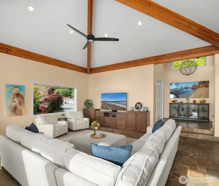 The spacious great room easily accommodates 12 guests, making it ideal for entertaining family and friends.
