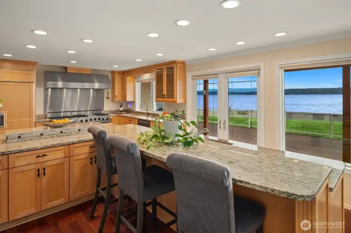 Guests will love gathering around the bar, watching you cook while taking in sweeping water and island views that stretch across Whidbey Island and beyond.