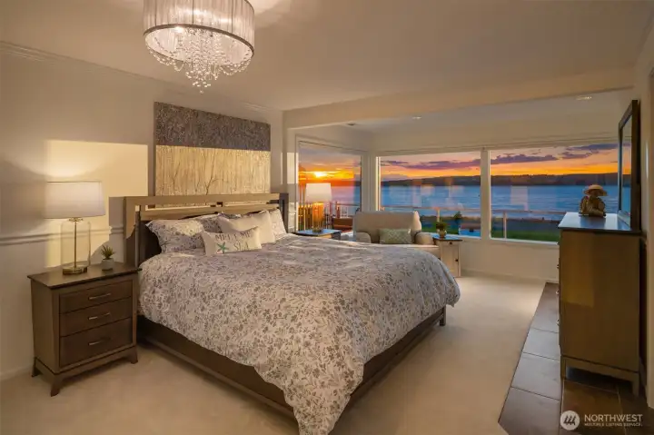 After a day of boating, kayaking, and waterfront adventures, retreat to the spacious primary suite and drift off to sleep as spectacular sunsets paint the sky beyond the water.