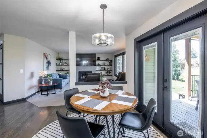 Eating nook in kitchen that leads to your gorgeous covered back trex deck.