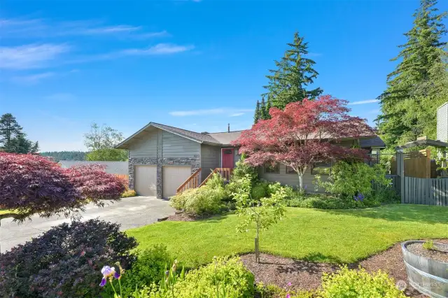 Welcome home to 3805 Bennett Ave! Featuring mature landscaping in a cozy, private yard