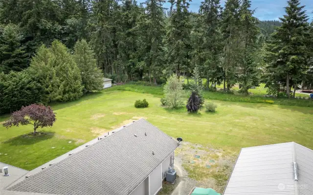 Beautiful level lot with room for gardening, quads or animals; so much potential