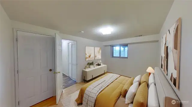 Lower-level bedroom w/virtual staging