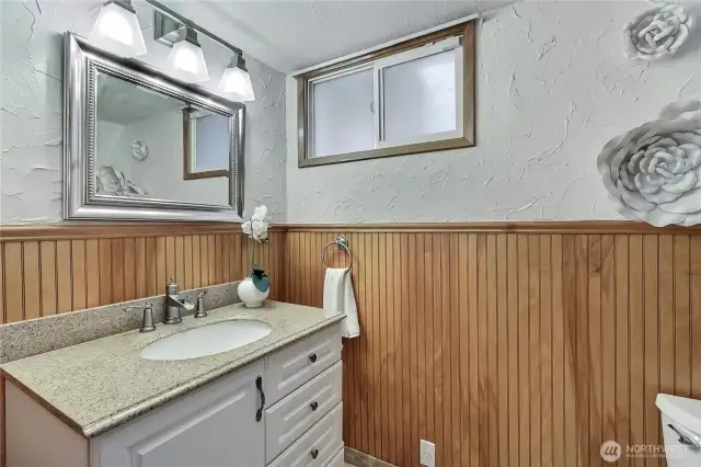 This flex room is plumbed with hot/cold water supply lines and drain, and 30 amp plug. Ready for kitchen conversion!
