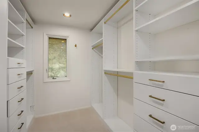 Custom walk-in closet in Primary Suite