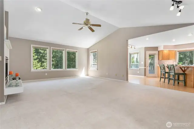Neutral tones, natural light, and a warm gas fireplace make this space inviting.