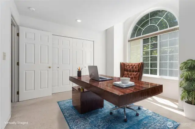 Virtually staged upstairs room—ideal as a bedroom or an office!