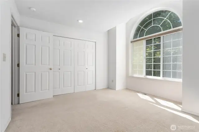 Upstairs bedroom with plenty of closet space and natural light.