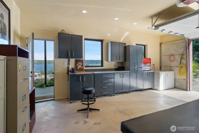 The attached cabinets in the garage convey