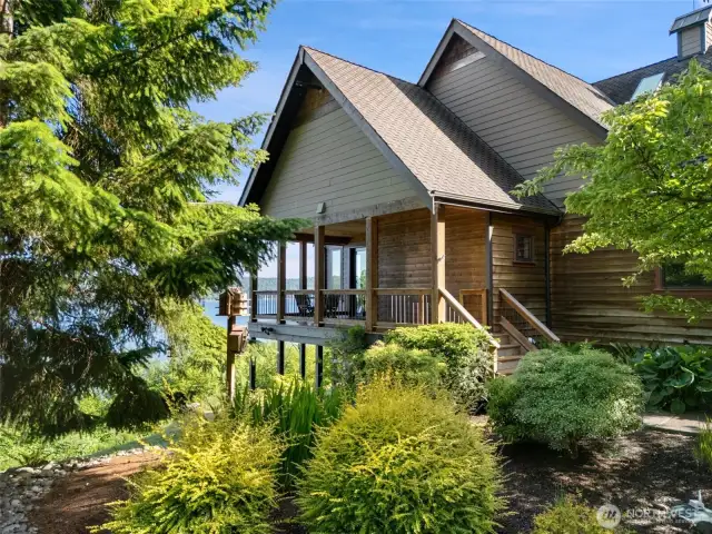 Private covered sitting porch off the kitchen