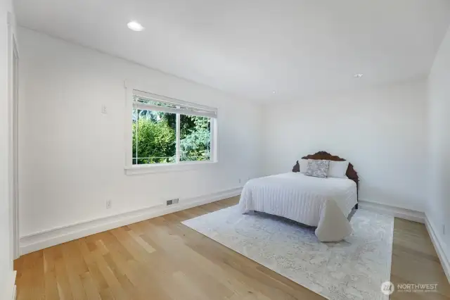 Second floor bedroom #4 - Hardwood floors, large window and a large closet.