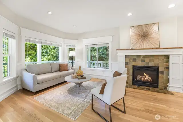 From the entry, the formal living space with gas fireplace is just to the left.