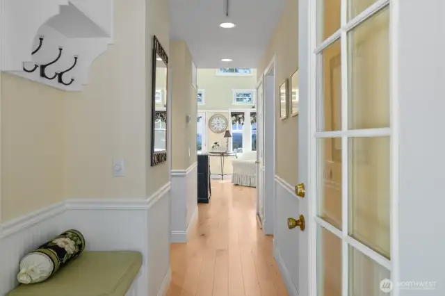 Front entry with bench and built-in coat rack w/ shelf