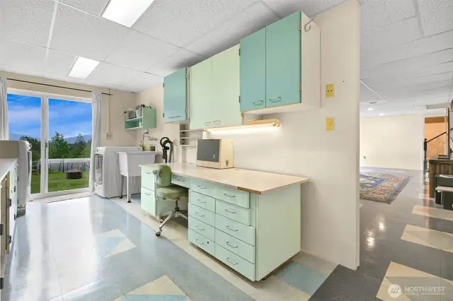 Utility room with a desk
