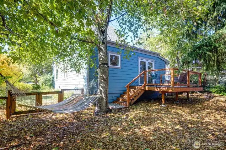 Looking at the home from back yard.