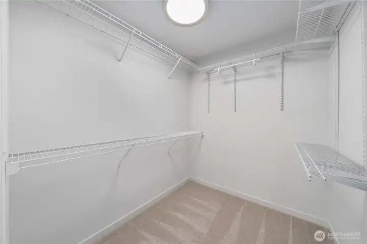 Spacious primary suite walk-in closet