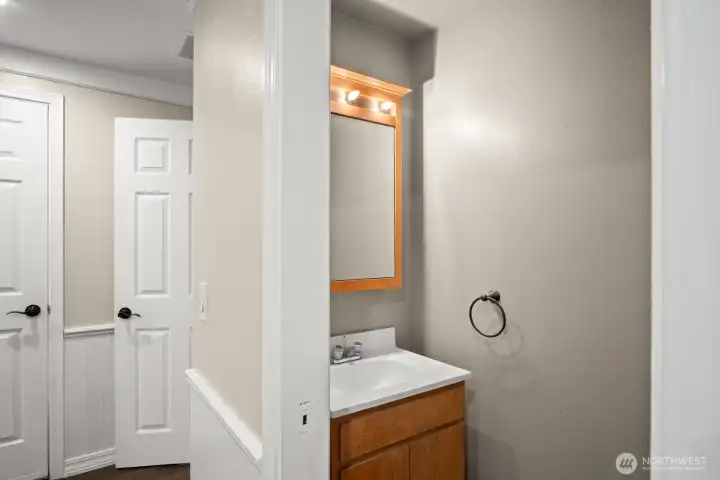 Half bath next to entertainment room