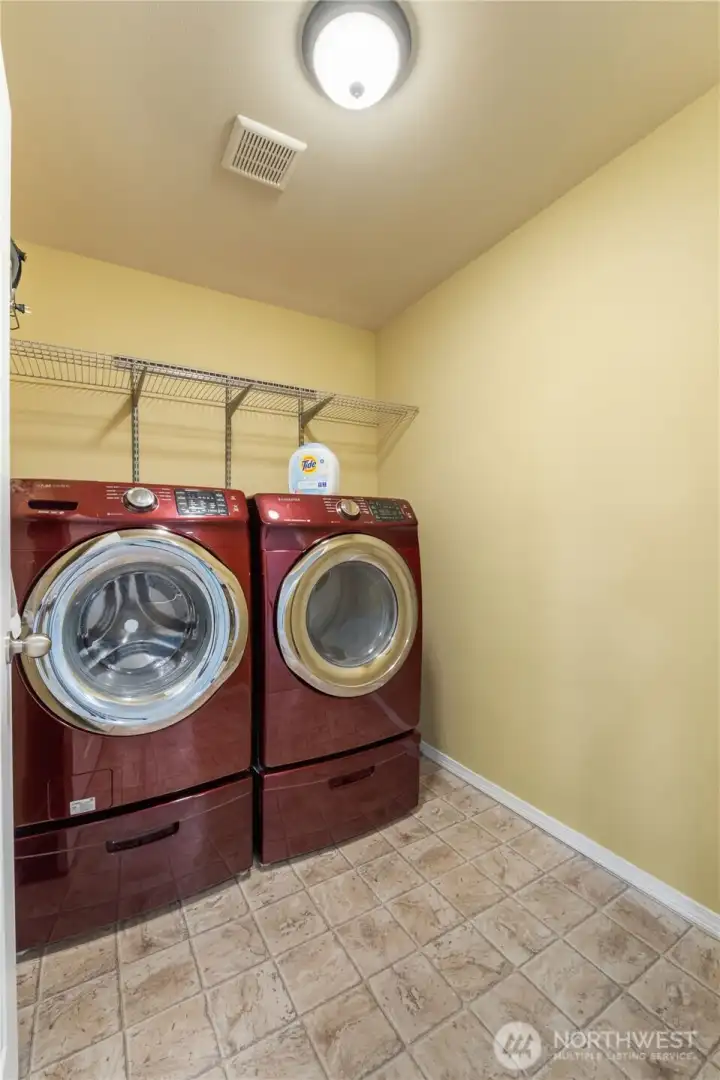 A dedicated upstairs laundry room, conveniently located near all bedrooms for practical everyday living.