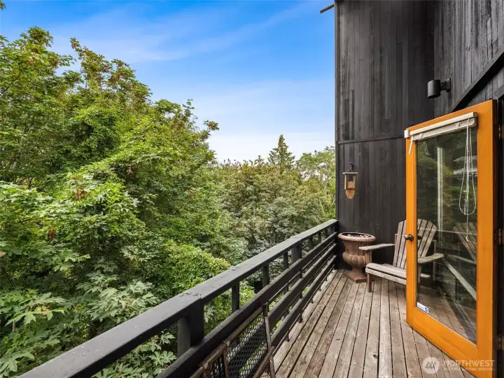 The French door off the living room lead to a view deck with storage closet