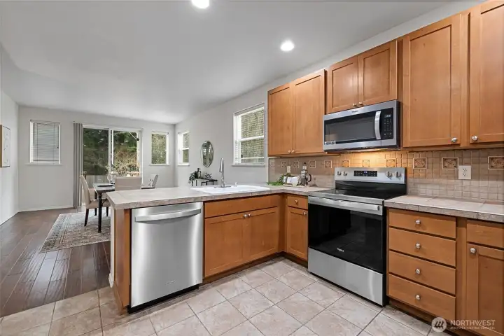 Spacious kitchen opening to the breakfast nook